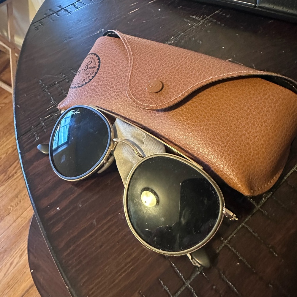 1 pair of Versace sunglasses and 2 pair of ray ban sunglasses. Barely worn.